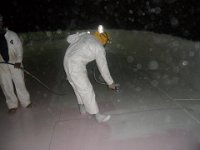 COATING SECOND COAT OF EPOXY 8 MILS PER COAT